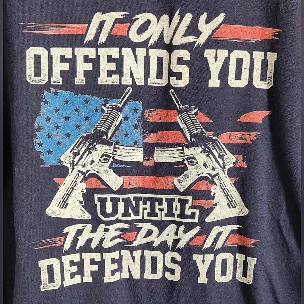 Men's shirt. "It only offends you until the day it defends you" Size XXL.